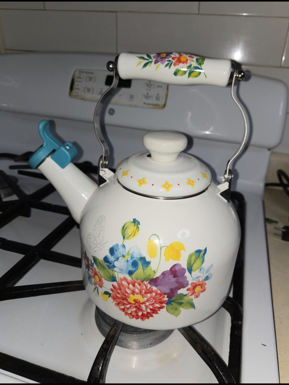 The Pioneer Woman White Floral Enamel Whistling Tea Kettle with Teal Spout